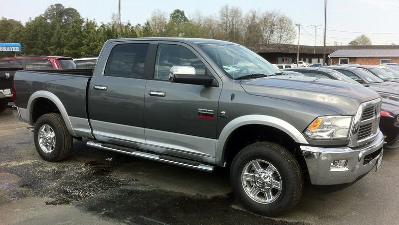 Gray and silver 2012 Ram 2500 Heavy Duty crew cab with the Cummins diesel